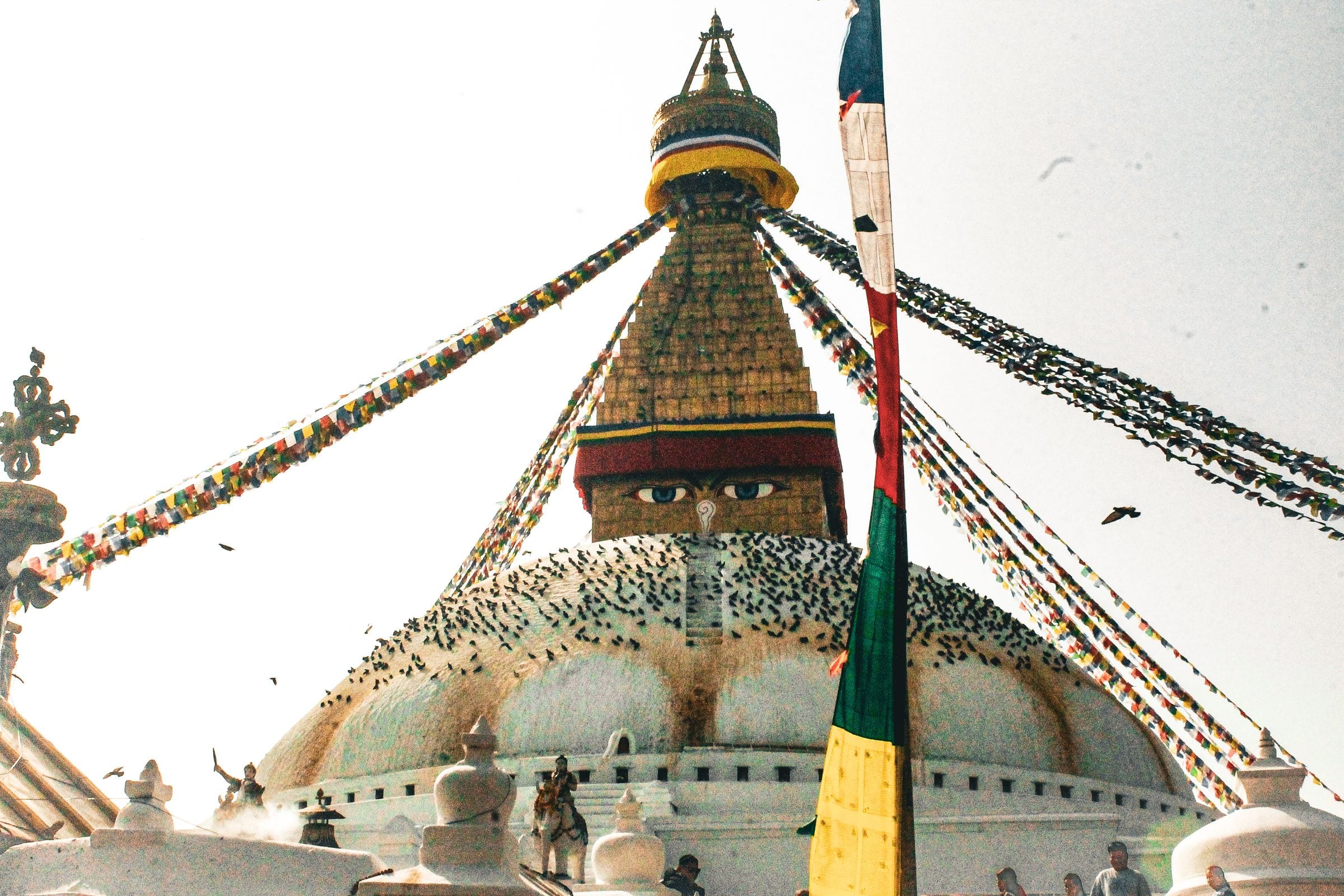 Boudhanath stupa in Kathmandu strung with prayer flags