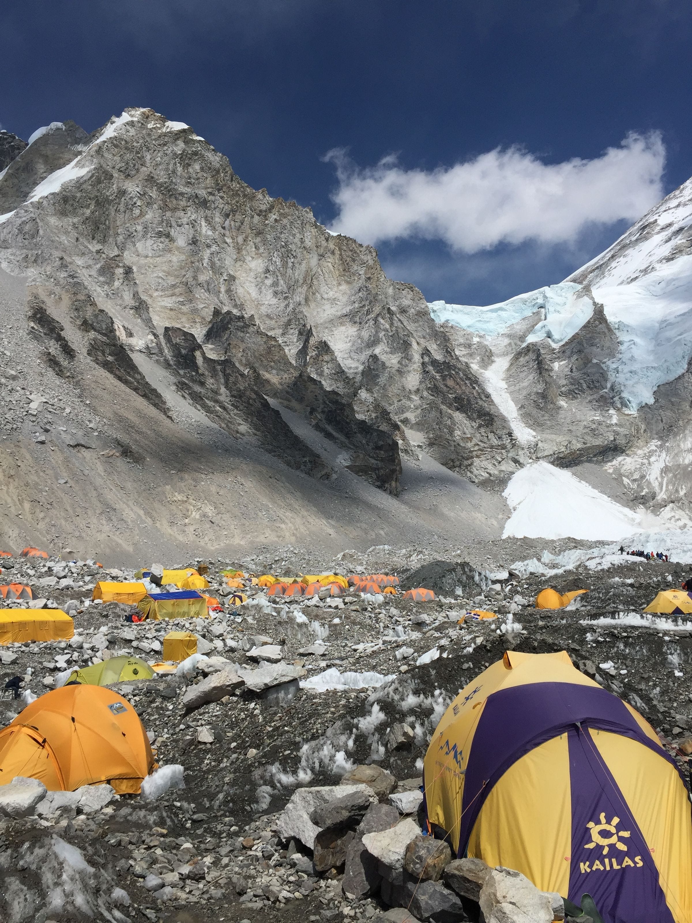 Yellow expedition tents pitched on the glacier at Everest Base Camp