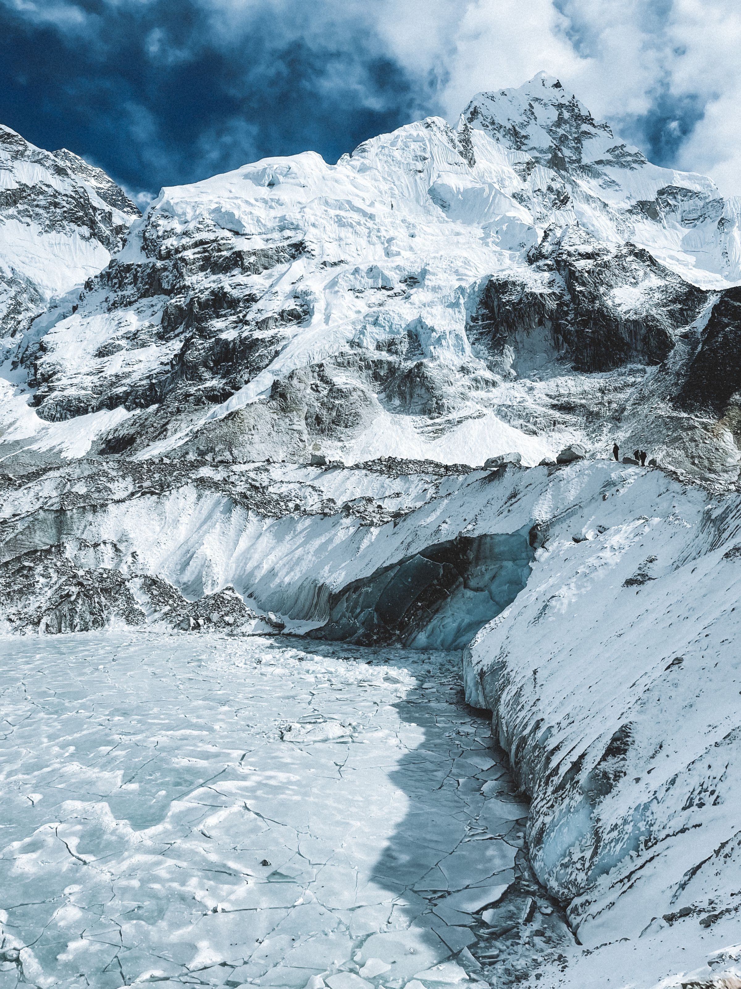 Frozen glacial ice and snow-covered rock high in the Khumbu