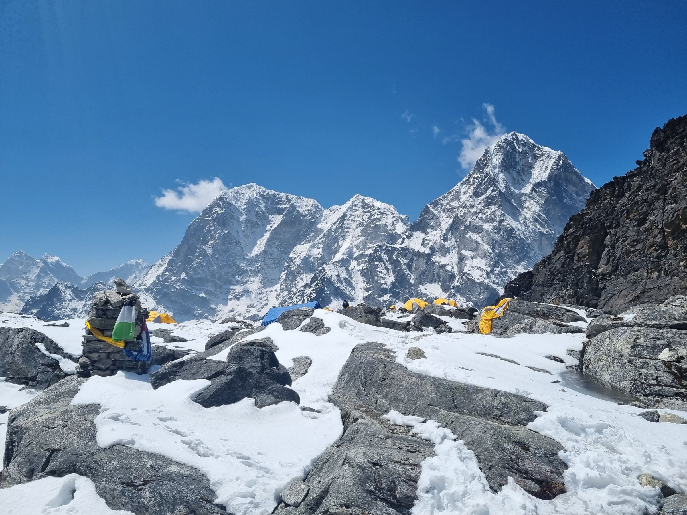 Prayer flags on the rocks above a Khumbu glacier camp