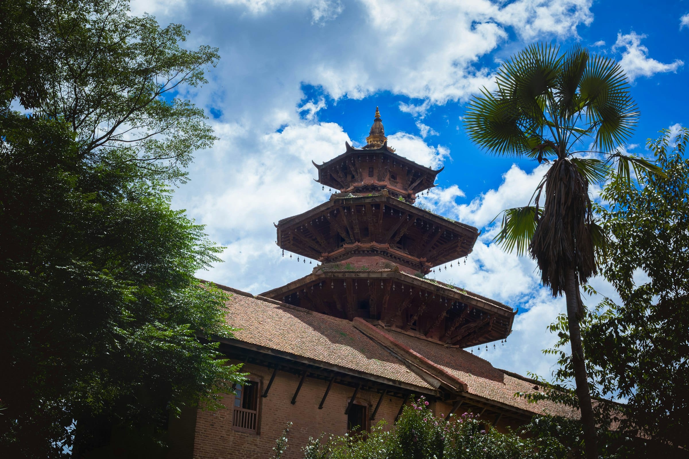 A tiered pagoda temple in Patan against a clear sky