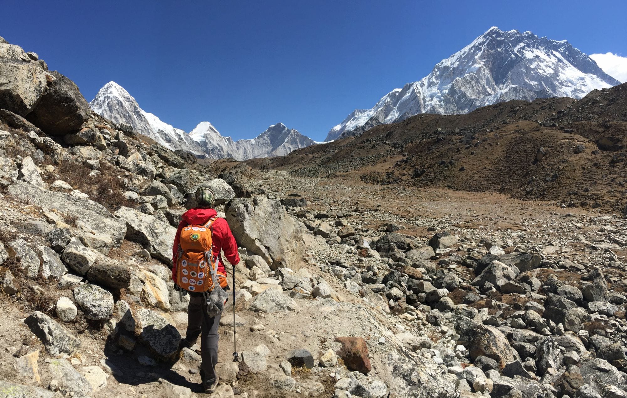 Trekker on a rocky Himalayan trail