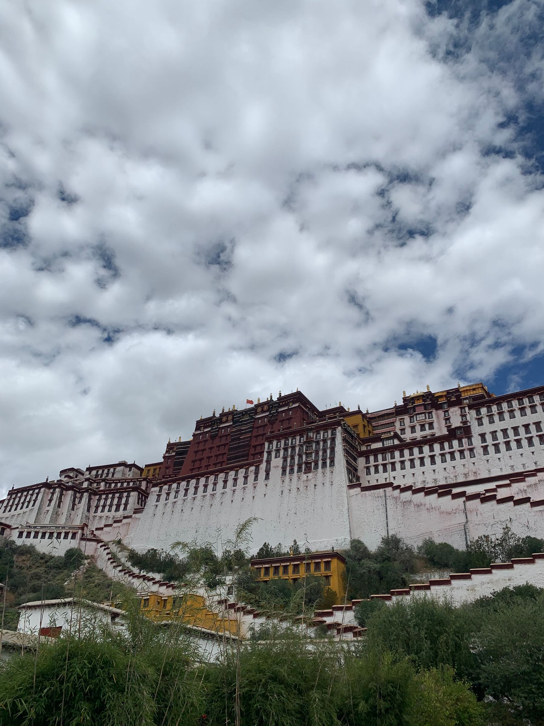 The Potala Palace in Lhasa under a dramatic sky