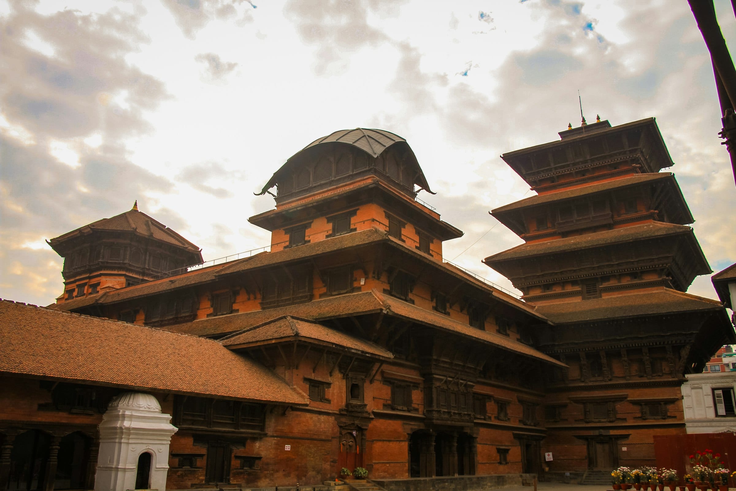 The tiered brick and timber towers of the old royal palace in Kathmandu Durbar Square