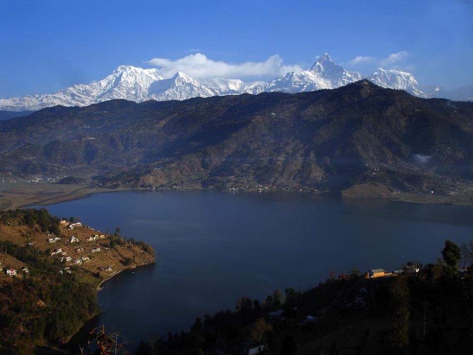 Phewa Lake beneath the Annapurna range and Machhapuchhre, seen from the hills above Pokhara