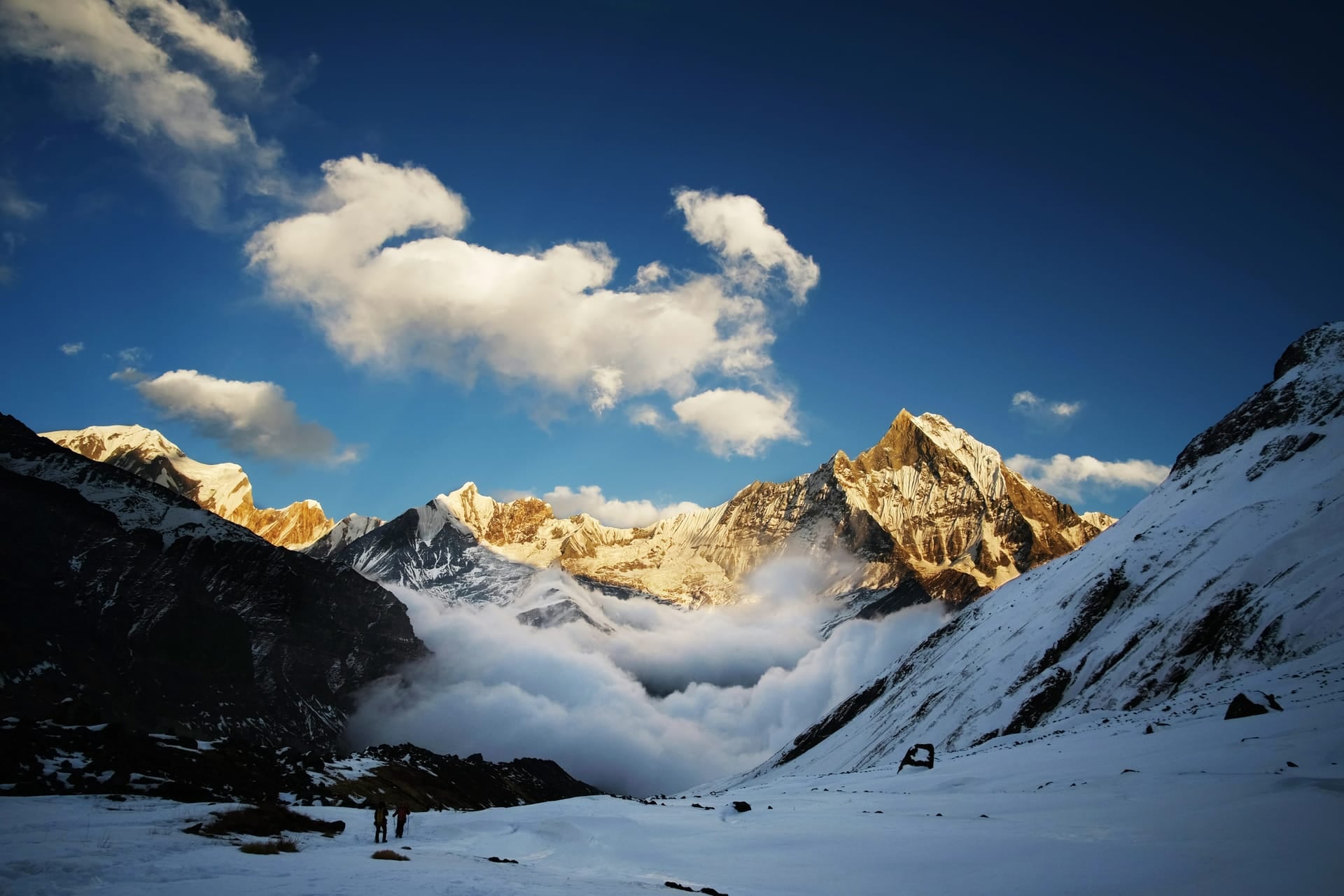 Sunrise catching snow peaks above a cloud-filled Langtang valley